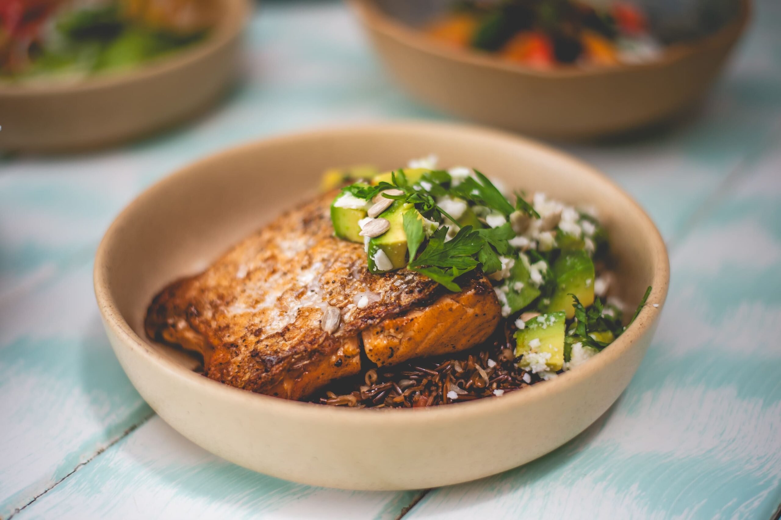 salmon on wild rice, with avocado and parsil at Fresco's Tulum